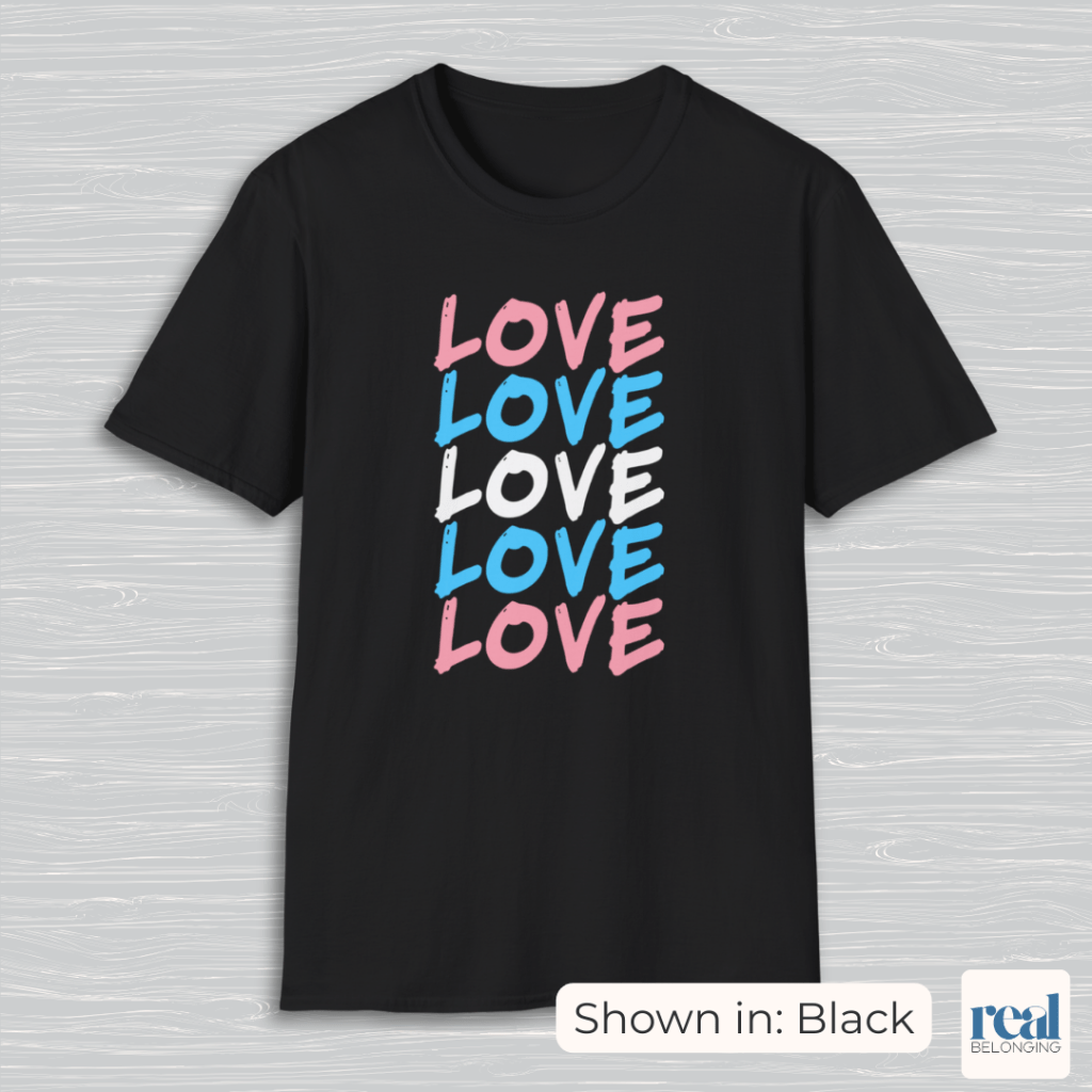 "Love" in Trans Pride flag colors on black t-shirt.